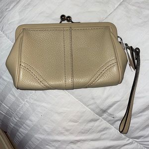 Coach wristlet.  Color Sand.  New with tags.